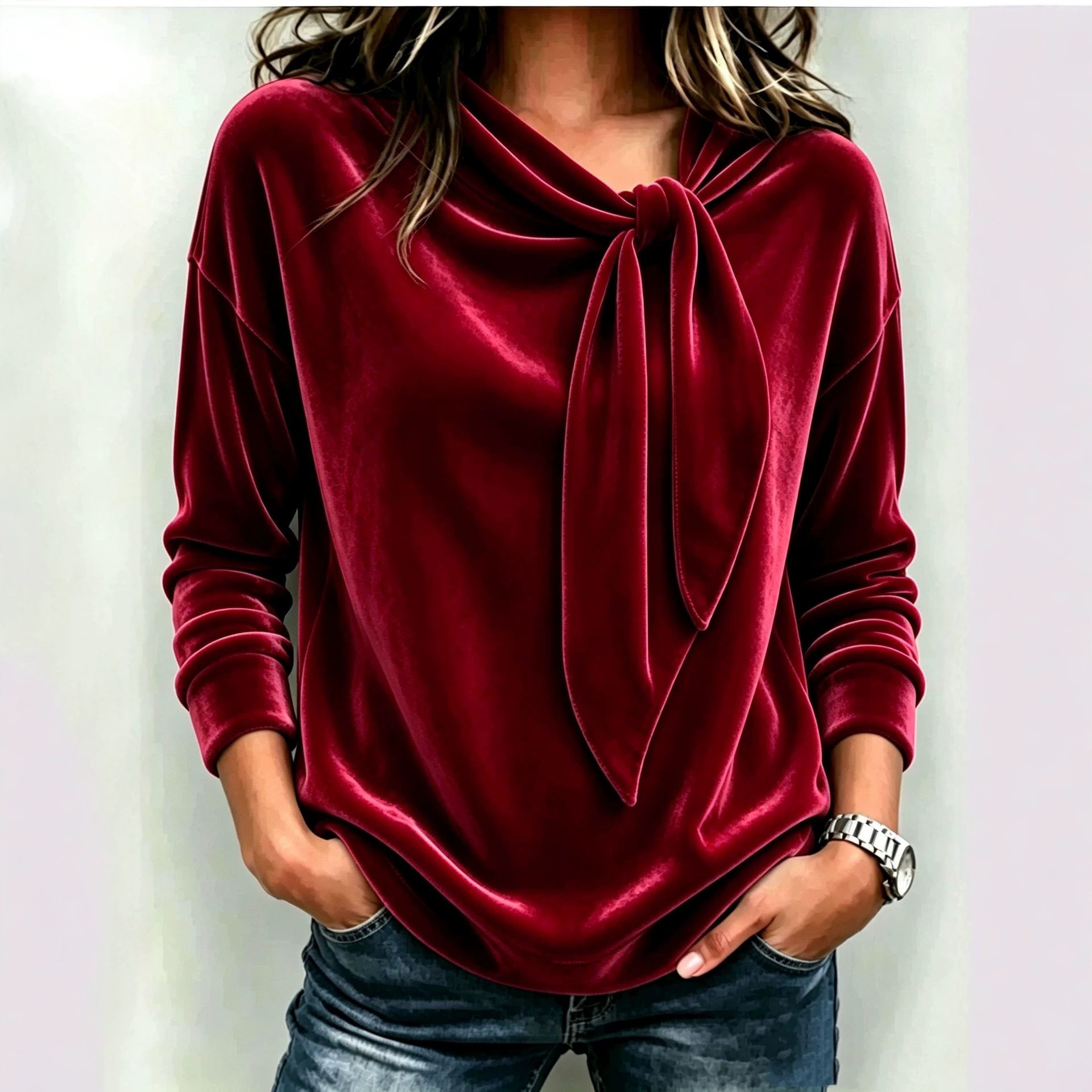Solid color long sleeved bow top