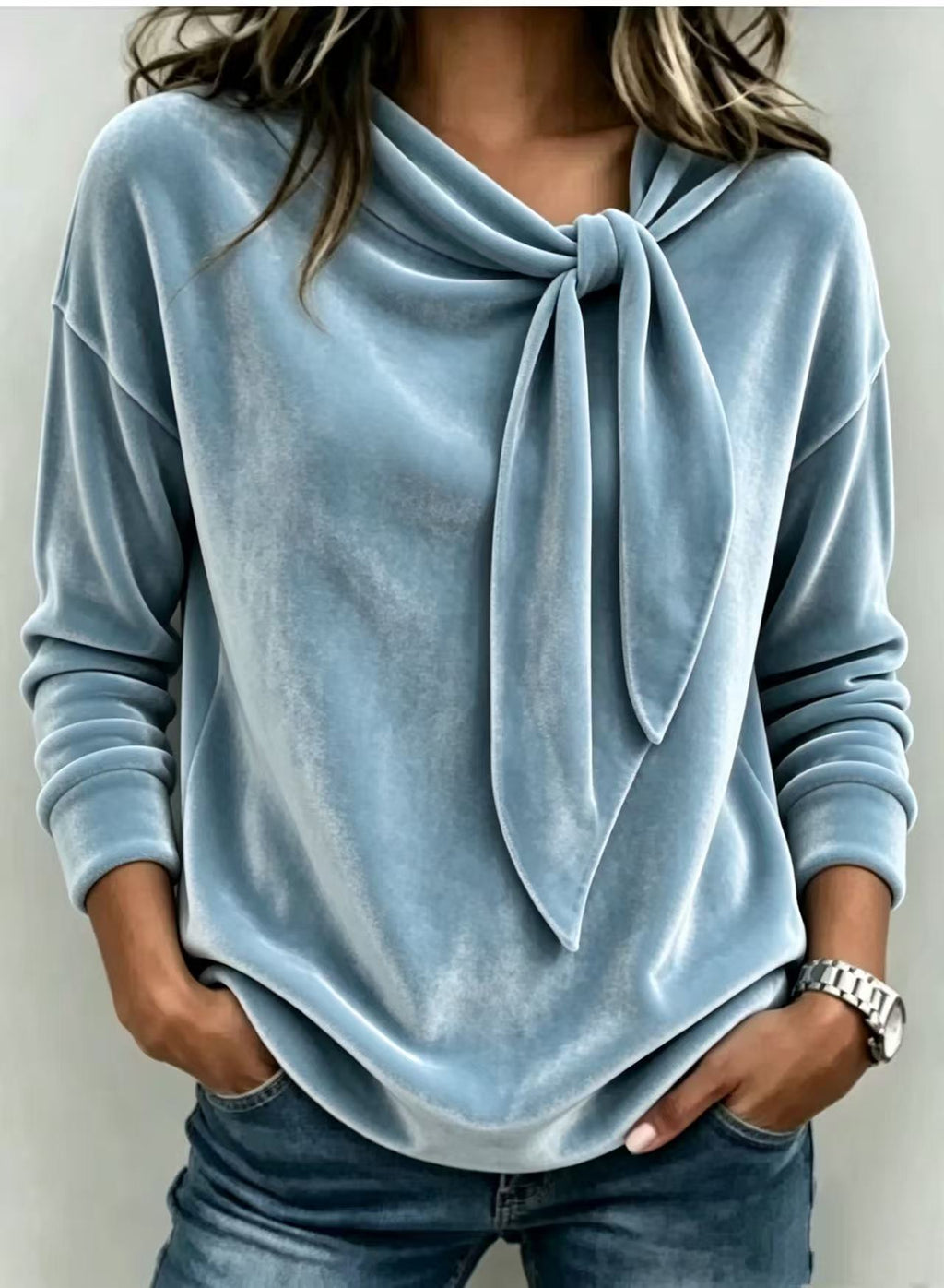 Solid color long sleeved bow top
