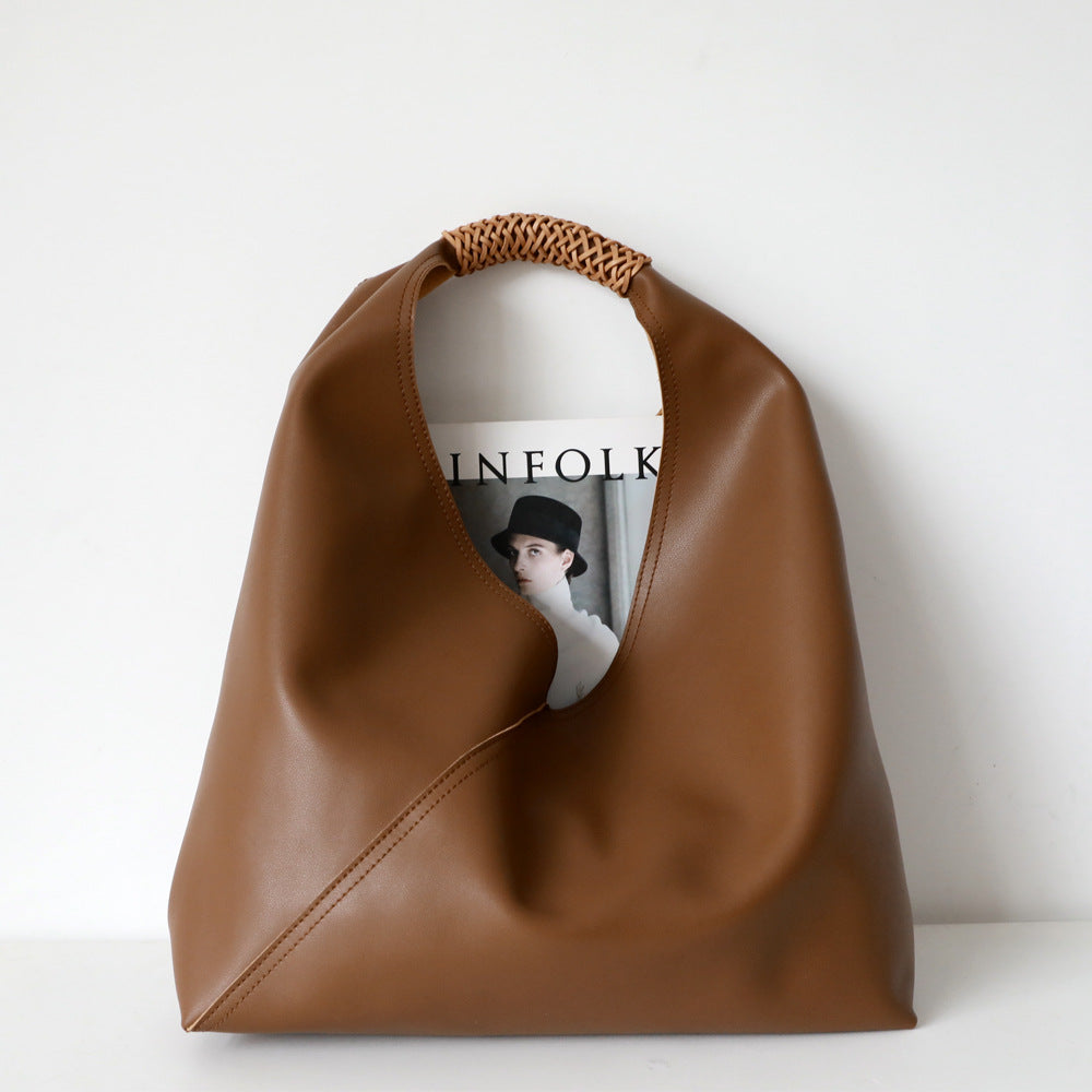 Spliced woven shoulder bag